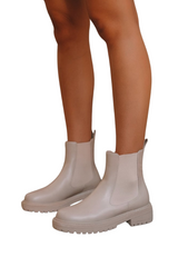 Be on trend in the Wrenley combat ankle boot by Billini. Perfect for making a statement this season, this fresh new tonal combat boot is here to take you from off-duty and beyond. With Wrenley's chunky rubber sole, closed round toe, and easy slip on style with a pull back tab, these boots are guaranteed to be your new year round go-to!