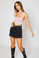 Strawberry swirl, you'll be making them twirl in our precious bustier crop top! Its' flattering bustier style silhouette will perfectly compliment any of your high rise denim, and its' smocked back ensures this number is as comfortable as it is cute!  Runs true to size, model wearing size small 100% Polyester Cropped length Partially lined