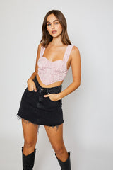 Strawberry swirl, you'll be making them twirl in our precious bustier crop top! Its' flattering bustier style silhouette will perfectly compliment any of your high rise denim, and its' smocked back ensures this number is as comfortable as it is cute!  Runs true to size, model wearing size small 100% Polyester Cropped length Partially lined