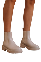 Be on trend in the Wrenley combat ankle boot by Billini. Perfect for making a statement this season, this fresh new tonal combat boot is here to take you from off-duty and beyond. With Wrenley's chunky rubber sole, closed round toe, and easy slip on style with a pull back tab, these boots are guaranteed to be your new year round go-to!