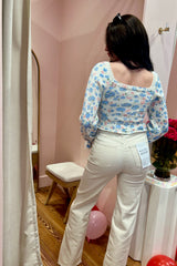 Far out, dude! The Far Out is a High Rise Relaxed Flare with a side slit. Sometimes you need a little bit of everything, so The Far Out in Raw Cut is made using our 11oz Just Right fabric. It is the perfect mix of rigid and stretch, built into modern silhouettes with vintage character. Reliably flattering, consistently kind. Paired here with our Market Mornings Sweater and You're the Pearl Bootie.