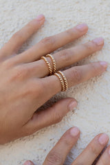 Our bold rope ring is almost too stunning to resist ~ we won't blame you if you get a couple to stack! Featuring a classic rope design, this statement ring adds a touch of glam to your everyday jewelry assortment. Rope Stack Ring. Gold Filled Handmade in Costa Mesa, CA.