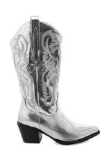 The boot of the season has arrived, and these metallic beauties are made for way more than just walking! The Danilo by Billini is a long western boot that gives the perfect touch of western inspired styling to your everyday, festival, or game day look!   If in between sizes, we recommend sizing up Heel height 7 cm Low stacked block heel Closed pointed toe Structured upper Western inspired embroidery Oversized side pull tabs for a pull on design Synthetic upper, lining and outsole