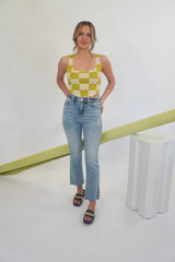 Once bitten, twice shy. The Shy Girl is a high rise crop flare, because sometimes you need a little bit of everything. The Shy Girl in Player is made using our our 11oz JUST RIGHT denim. It's the perfect mix of rigid and stretchy, built into modern silhouettes with vintage character. Organically made, reliably flattering. Our Shy Girl Jean is shown here with our Crochet Check Lace Back Top, Sweet Greens Bustier, and Slay Gel Heel.