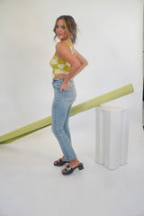 Once bitten, twice shy. The Shy Girl is a high rise crop flare, because sometimes you need a little bit of everything. The Shy Girl in Player is made using our our 11oz JUST RIGHT denim. It's the perfect mix of rigid and stretchy, built into modern silhouettes with vintage character. Organically made, reliably flattering. Our Shy Girl Jean is shown here with our Crochet Check Lace Back Top, Sweet Greens Bustier, and Slay Gel Heel.