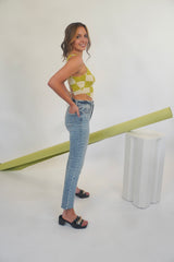 Once bitten, twice shy. The Shy Girl is a high rise crop flare, because sometimes you need a little bit of everything. The Shy Girl in Player is made using our our 11oz JUST RIGHT denim. It's the perfect mix of rigid and stretchy, built into modern silhouettes with vintage character. Organically made, reliably flattering. Our Shy Girl Jean is shown here with our Crochet Check Lace Back Top, Sweet Greens Bustier, and Slay Gel Heel.