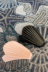 Just selling seashells by the seashore... wearing this precious hair clip! Perfect to get yourself in that vacay spirit no matter where you're at, these functional and on point hair clips will be your go-to accessory this summer.  Measure approximately 3.25" x 2.5" x 2.5"  Gold tone hardware Medium to large capacity hair hold