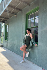 Take some time to just breathe, because this lightweight, bodycon seamless onesie has got your back and will ensure you're truly ready for it all. Featuring a supportive, sweat-wicking material that perfectly flatters your every curve, a show-stopping criss-cross detail at the back, and breathable holes in the biker shorts, this piece will be there for you from your morning workout to your day out on the town. Shown here layered with our Raw and Real Flow Tank and Take a Break Smocked Windbreaker Short.