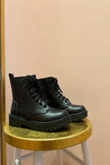 Perfectly suited for all of your rendezvous (or for hitting up Magazine Street's very own Rendezvous), these classic combat boots are here to edge up your look or provide the perfect contrast to your flirty, feminine dresses. Featuring a classic Doc Marten design with a convenient side zip detail, these gems will last you for years to come and get better with every wear.