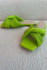 Aptly named... our Electric Slide Flats will have you and the whole town buzzing with their perfectly on trend neon pop of color! These bright beauties feature a comfort sole and scrunchy straps that guarantee you're effortlessly comfortable.