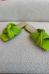 Aptly named... our Electric Slide Flats will have you and the whole town buzzing with their perfectly on trend neon pop of color! These bright beauties feature a comfort sole and scrunchy straps that guarantee you're effortlessly comfortable.
