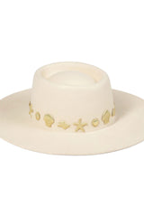 Chic to the core and now available as our limited edition ‘Summer of Sun’ hat. Featuring our classic ivory dipped boater silhouette with custom made gold Lack of Color seaside conchos. Unforgettable. Always wearable.