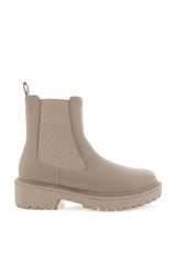 Be on trend in the Wrenley combat ankle boot by Billini. Perfect for making a statement this season, this fresh new tonal combat boot is here to take you from off-duty and beyond. With Wrenley's chunky rubber sole, closed round toe, and easy slip on style with a pull back tab, these boots are guaranteed to be your new year round go-to!