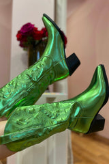 The boot of the season has arrived, and these metallic beauties are made for way more than just walking! The Danilo by Billini is a long western boot that gives the perfect touch of western inspired styling to your everyday, festival, or game day look!