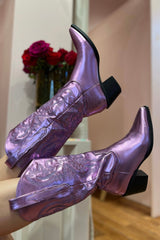 The boot of the season has arrived, and these metallic beauties are made for way more than just walking! The Danilo by Billini is a long western boot that gives the perfect touch of western inspired styling to your everyday, festival, or game day look!