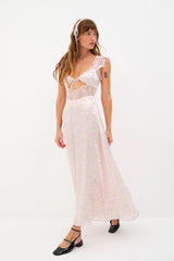 Beauty in bloom ~ Introducing the Estelle Maxi Dress from For Love & Lemons. Self: 60% Viscose/40% Polyester; Lining: 100% Recycled Polyester; Blush blooms burn-out Ruffle trimmed shoulder straps with skinny tie detail Delicate inset lace along neckline & waist Low cut back with functional skinny tie Fully lined in chiffon Invisible zip closure  Eco Dry clean recommended. Avoid cleaners that use harmful chemicals like "perc".