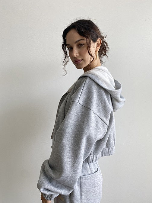 Tell it how it is with our Sleepy and Sleepy Embroidered Zip Up Hoodie! This relaxed fit, cropped hoodie is just made for lounging in, yet perfect for throwing on when you're running out the door. Made with the softest fleece fabric and complete with the sweetest yellow embroidery, this set is guaranteed to be a favorite all year long. Our Sleepy + Sleepy Embroidered Zip Up Hoodie is shown here with our Sleepy + Sleepy Embroidered Sweat Shorts.