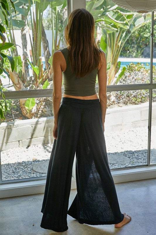 This plunging V-Neck crop top is giving us strictly good vibes, and is identical to your favorite Free People basics! With its' seamless, finely ribbed material and plunging v-neck, you'll be wearing this gem all the way from your morning workout to that happy hour you're planning on hitting.  Supportive fit, runs true to size Cropped length Seamless