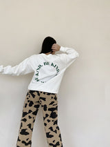 Sometimes we all need a little reminder that kindness is key (especially now!), and our Be Kind Sweatshirt is here to help you spread that message and be effortlessly comfortable while doing so. Classic relaxed crewneck silhouette in the softest cotton fleece, this piece is guaranteed to make you feel good while doing good!  Runs true to size, model wearing size small Self: 60% Polyester, 40% Cotton; Contrast: 95% Cotton, 5% Spandex Relaxed fit Crewneck