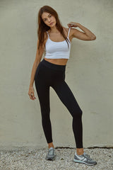 This perfectly effortless brami is giving us some seriously good vibes, and is identical to your go-to Free People basics! With its' perfectly cropped length and seamless, ribbed material, you'll be wearing this gem all the way from your morning workout to your night plans.   Supportive fit, runs true to size Cropped length Seamless