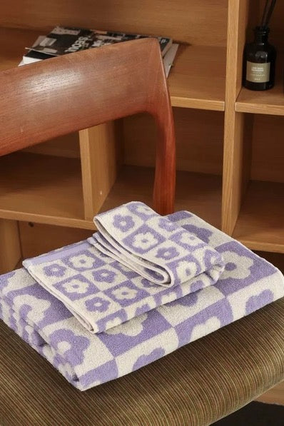 Get ready to Vacay Away and make sure you bring this precious beach towel! Featuring ultra absorbent, water wicking cotton material, a resort size and on-trend playful print, this essential vacation staple is meant to be loved for years to come.  100% Cotton Measures 70 x 140 CM Multi = floral print checkered design Check = solid checkered design
