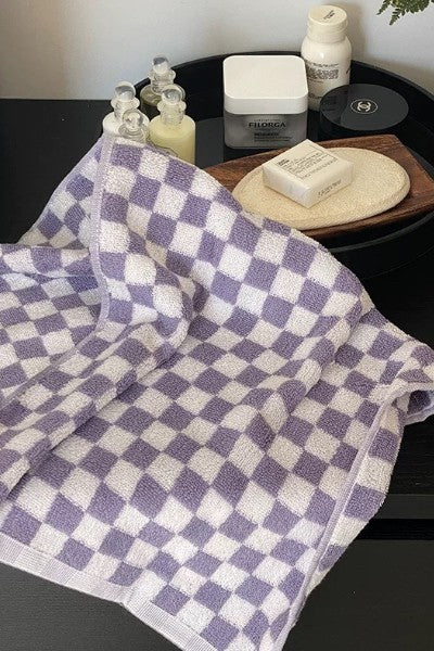 Get ready to Vacay Away and make sure you bring this precious beach towel! Featuring ultra absorbent, water wicking cotton material, a resort size and on-trend playful print, this essential vacation staple is meant to be loved for years to come.  100% Cotton Measures 70 x 140 CM Multi = floral print checkered design Check = solid checkered design