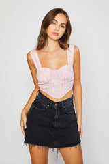 Strawberry swirl, you'll be making them twirl in our precious bustier crop top! Its' flattering bustier style silhouette will perfectly compliment any of your high rise denim, and its' smocked back ensures this number is as comfortable as it is cute!  Runs true to size, model wearing size small 100% Polyester Cropped length Partially lined