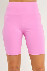 Be instantly transported to a pink paradise in these effortlessly comfortable (and cute!) biker shorts. Sweat-wicking material that's perfectly supportive for your workout class and a figure flattering fit that will ensure you're perfectly put together for the day's activities afterwards. Pairs perfectly with our Pink Paradise Knotted Cut Out Sports Bra.