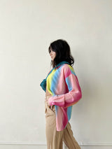 Taste the rainbow... this perfect, relaxed fit button down is here to add that much needed pop of color to your wardrobe. Throw it on to brighten up any day at the office, open it up over your go-to bralette for that post-work happy hour, and toss it in your suitcase for the perfect swim cover up - this piece can truly do it all!  Relaxed, oversized fit. If you'd like a smaller fit, we recommend sizing down. Model wearing size small 100% Polyester Unlined Collar Functional button front