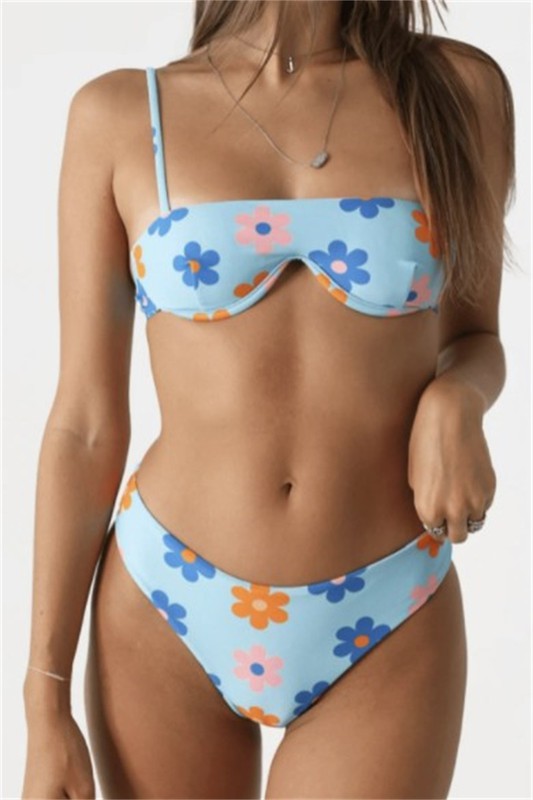 Nope, no blues here with this precious underwire bikini set! With a modern twist on the classic, supportive underwire design and a fun and flirty V-cut bottom that sits perfectly above the hips, this playful set is sure to be a favorite anytime you're looking for a pop of color! 