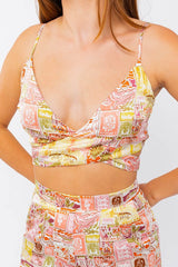 Oh the places you'll go in this stunning smocked tie back top... just be sure to send me a postcard! Perfectly printed in the sweetest sun-seeking color scheme that perfectly embodies your adventurous spirit and cut in a classic, V-neck, criss-cross front silhouette with functional tie back detail and flattering smocked back. Pairs perfectly with our Send me a Postcard Straight Leg Pant.