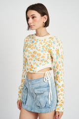 Sunsets in spring and all thing serene in this precious floral sweater! Featuring a cropped silhouette, classic crew neckline, and anything-but-classic cutouts at the waist with functional drawstring details to perfectly cinch it all together. An instant team-favorite and the perfect pre-spring transition piece.