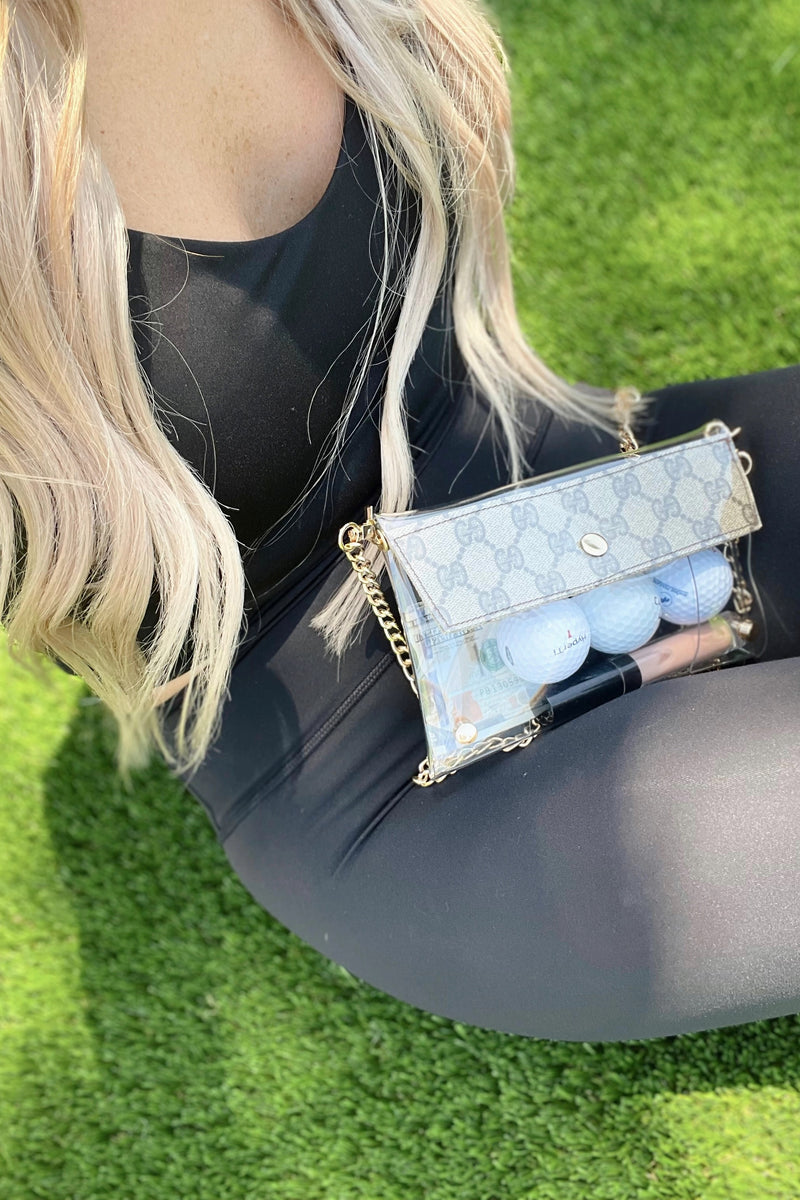 You know you need me. These stadium approved clear bags can be worn as a fanny pack or crossbody and feature an upcycled patch from luxury handbags!  8.5 in x 6.7 in (fits iPhone Pro Max)  Authentic upcycled material from luxury handbags Clear bag policy approved for any and all concerts, games, and indoor arenas 