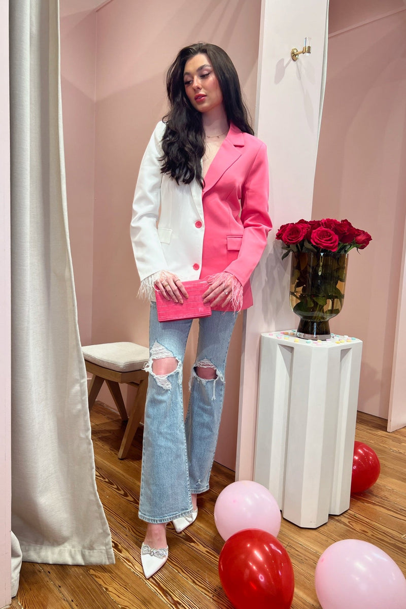 Why pick a side when you don't have to? We are loving on this color-blocked half white, half pink blazer. The cuffs are dripping with a light feather detail and the overall quality of this piece is just oh so good. You'll stand out in this one boss. Paired here with our Go Getter High Rise Flare Jean in Just Kissed, Nights like These Heel, and Laina Crossbody Bag.