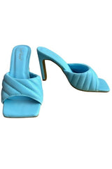 Feelin' blue? Throw on this perfect open toe mule to turn any day around and make it one to remember! Featuring a square toe, pleated strap and 4 inch heel, these beauties can elevate any look, be it casual or classy. Our Feelin' Blue Mule is shown here with our Spring Showers Mini Dress and I think I like you Pink Set.  Runs true to size Comfort sole 4 inch heel Square toe