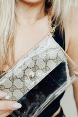 You know you need me. These stadium approved clear bags can be worn as a fanny pack or crossbody and feature an upcycled patch from luxury handbags!  8.5 in x 6.7 in (fits iPhone Pro Max)  Authentic upcycled material from luxury handbags Clear bag policy approved for any and all concerts, games, and indoor arenas 