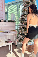Oops, made you look in the dreamiest mini slip dress! Designed for off-duty days that seamlessly lead into flirty nights, this flattering bias-cut, soft and slinky mini is the year-round LBD slip you'll be going back to for years to come. Topped off with a romantic lace detailing and an eye-catching low back, guaranteed to have them doing double takes. Paired here with our Sweet and Southern Embroidered Boot, City Never Sleeps Vegan Leather Trench, and Stay A While Turtleneck Sweater.