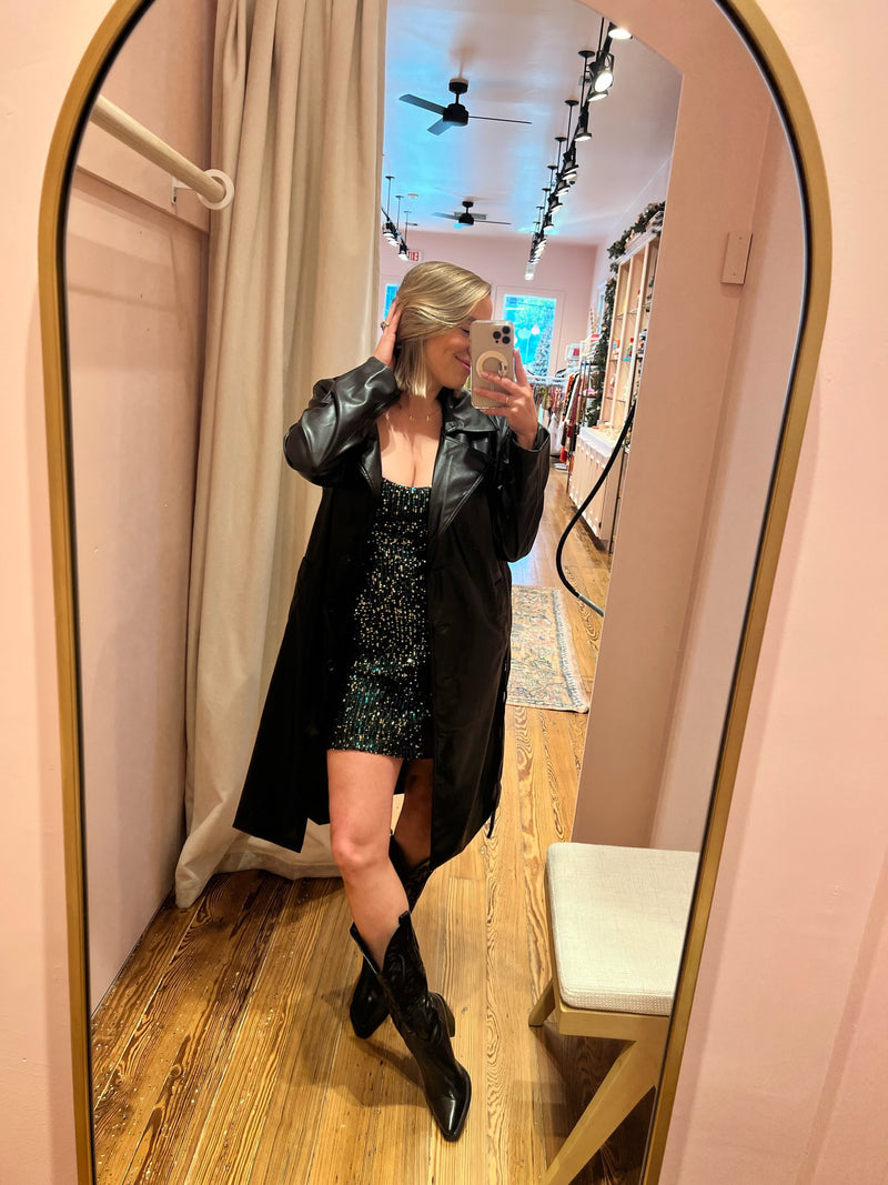The most-loved, best-selling mini dress that had us Head Over Heels is back, better than ever and has us Seeing Sequins! Featuring a flattering bias cut, modern and edgy curve bustier detail, classic slip silhouette fully adorned by sequins and eye-catching back, this gem is a guaranteed head-turner for all things cocktail soirées, Holiday season, and Mardi Gras. Paired here with our most-loved Danilo Western Boot and City Never Sleeps Vegan Leather Trench.