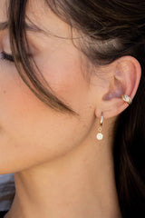 So versatile and so effortless, we could not be more in love with this stunning Ribbon Ear Cuff! No piercings necessary and the perfect start to any ear party.  Ear cuff ~ no piercing necessary Stack a couple for extra edge Gold Filled Handmade in Costa Mesa, CA.