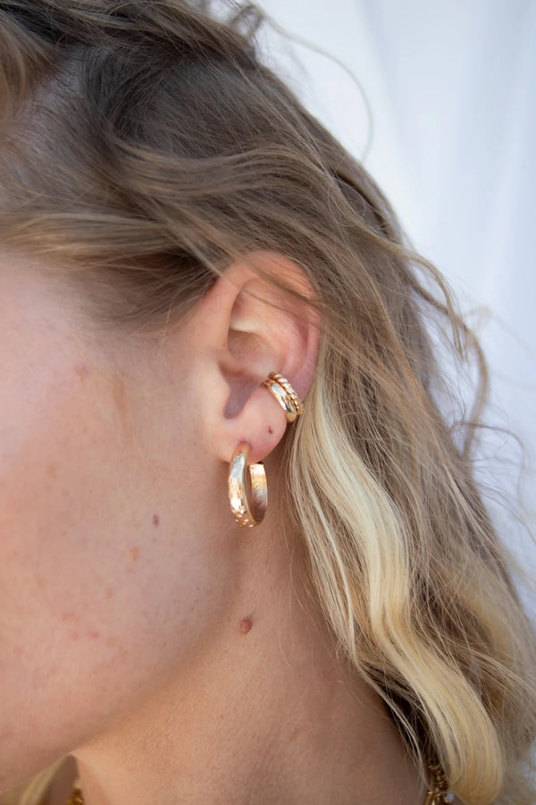 No piercings required, this hammered ear cuff is the perfect stackable gem to add to your ear party!   Ear cuff Gold filled Hammered appearance