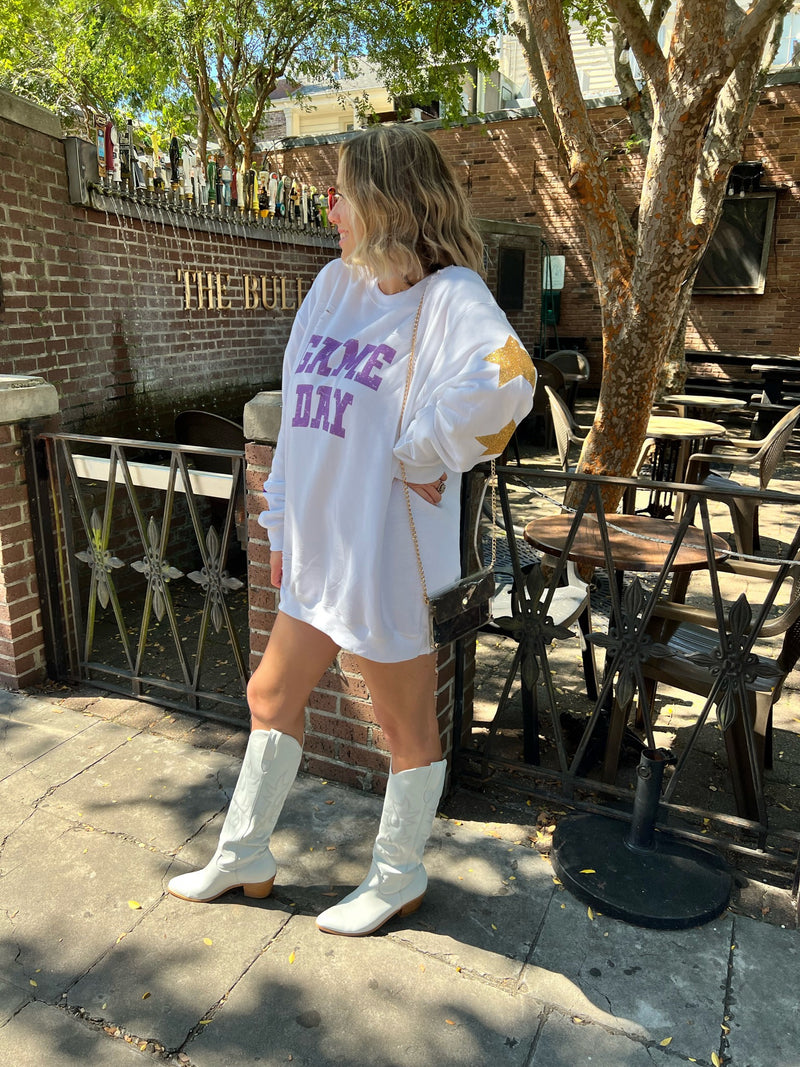 Alright, y'all... we almost can't contain our excitement over these Game Day Custom Vintage Crewnecks! Made exclusively for SYBB, these beauties are here to bring your game day wardrobe up a notch in comfort and cuteness. Distressed throughout and with a worn-in, vintage inspired feel, in colorways perfect for all things LSU, Saints, and Mardi Gras! 