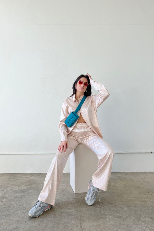 These jacquard satin pants are giving us all the effortlessly cool vibes that you find along the West Coast. With a classic, high waisted, straight leg fit and flattering trouser pleats, these beauties can truly do it all. Pair them with our West Coast Jacquard Satin Button Down for a special event or to wear to the office.