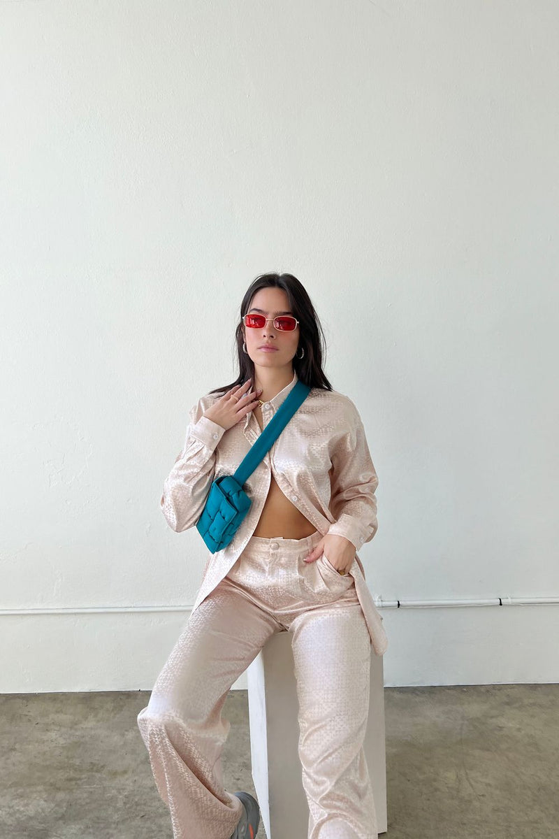 These jacquard satin pants are giving us all the effortlessly cool vibes that you find along the West Coast. With a classic, high waisted, straight leg fit and flattering trouser pleats, these beauties can truly do it all. Pair them with our West Coast Jacquard Satin Button Down for a special event or to wear to the office.