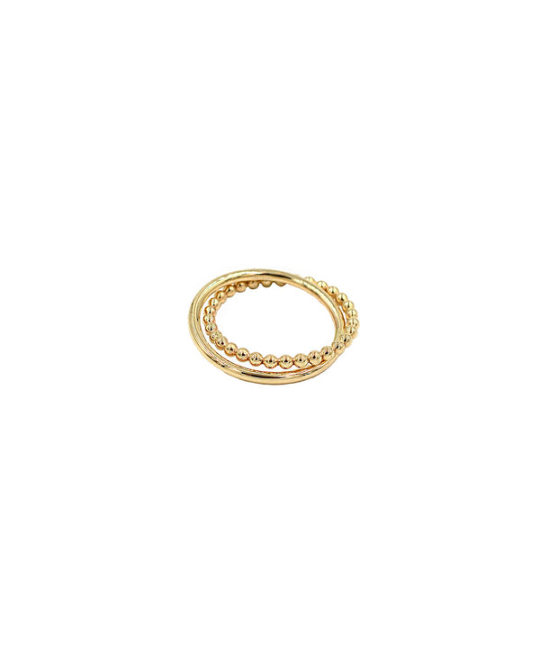 Intricate and elegant, yet effortlessly worked into your everyday jewelry routine, our Beaded Interlock ring features one beaded band and one smooth band and is unique as it is versatile!  Gold filled Double band ring. One beaded band and one smooth band are interlocked to create this unique double ring Shown on model's pointer finger