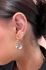 Elegant and classic, but with a playful pop of color... these delft flower beaded C-hoops are the modern twist on the classic hoop that we've been waiting for!  Measure ~ 1" long Sold as a set Open C-Hoop earrings