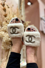 Slide on over Coco, these cozy slippers are here to stay! With a rubber sole worthy of Sunday strolls down Magazine and an ultra plush footbed, it's safe to say these slippers will be sneaking their way into our daily shoe collection.