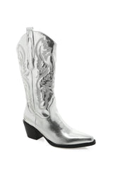 The boot of the season has arrived, and these metallic beauties are made for way more than just walking! The Danilo by Billini is a long western boot that gives the perfect touch of western inspired styling to your everyday, festival, or game day look!   If in between sizes, we recommend sizing up Heel height 7 cm Low stacked block heel Closed pointed toe Structured upper Western inspired embroidery Oversized side pull tabs for a pull on design Synthetic upper, lining and outsole