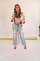 They don't make them like this anymore, until now. The Pleaser is a straight leg jean  in organic cotton with an eco-friendly wash process. Fits relaxed from the high rise to the ankle-length hem. Finished with a zipper fly and 5 pockets. Our Pleaser High Rise Jean is styled here with our Little & Lace Cami, Work of Art Button Down, and Be My Clementine Mule.