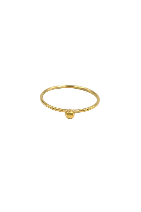 Simple and classic, our Dot ring adds a touch of elegance to your everyday look. Featuring a delightfully dainty gold dot detail, this piece will be one you aren't sure how you lived without before! Ring with dot detail Gold Filled ~ won't tarnish or turn Handmade in Costa Mesa, CA.