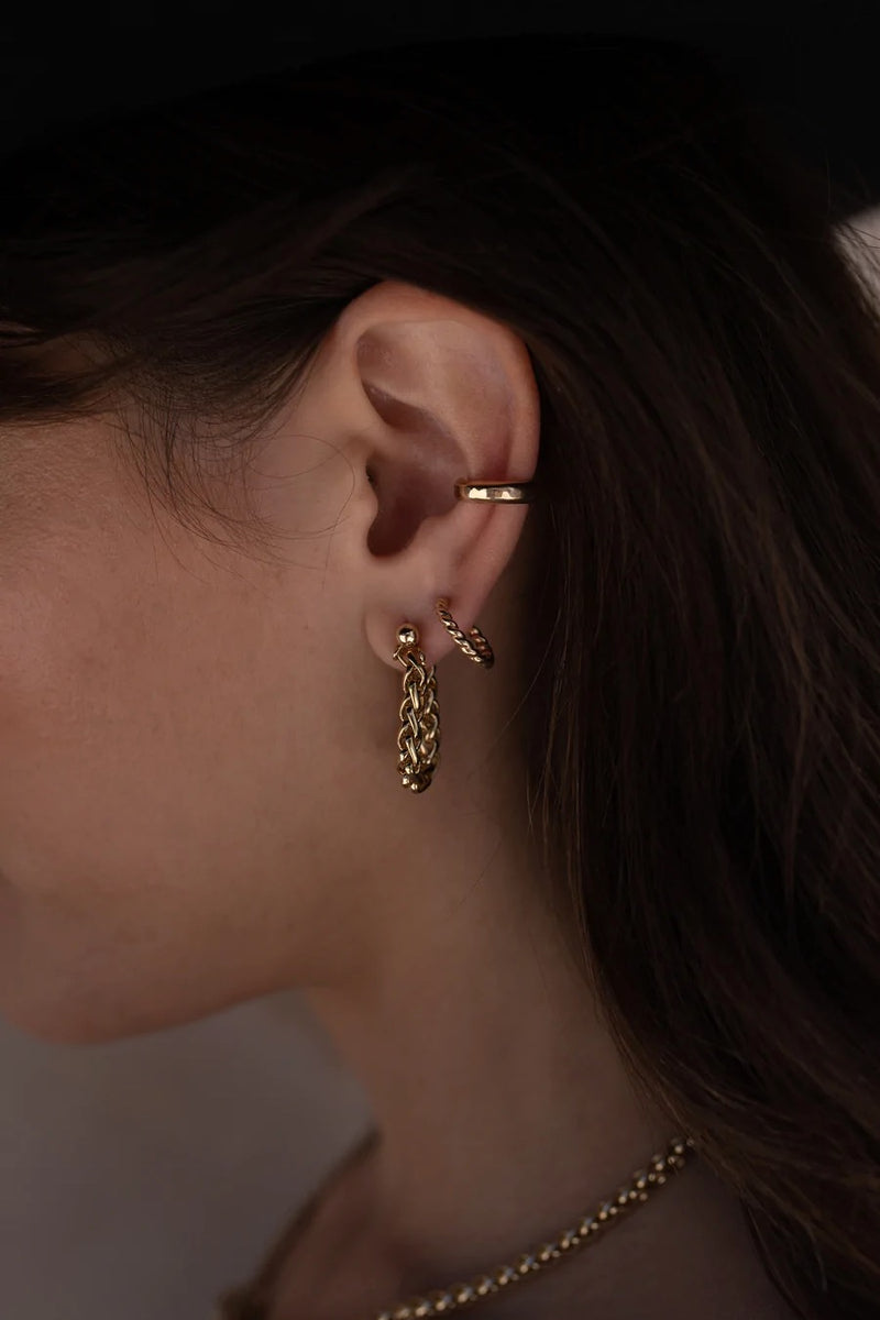 No piercings required, this hammered ear cuff is the perfect stackable gem to add to your ear party!   Ear cuff Gold filled Hammered appearance